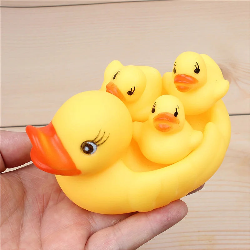 4PCS Cute Duck Baby Bath Toys Little Yellow Duck With Squeeze Sound Rattle Soft Rubber Water Toy Children Summer Bathroom Gift